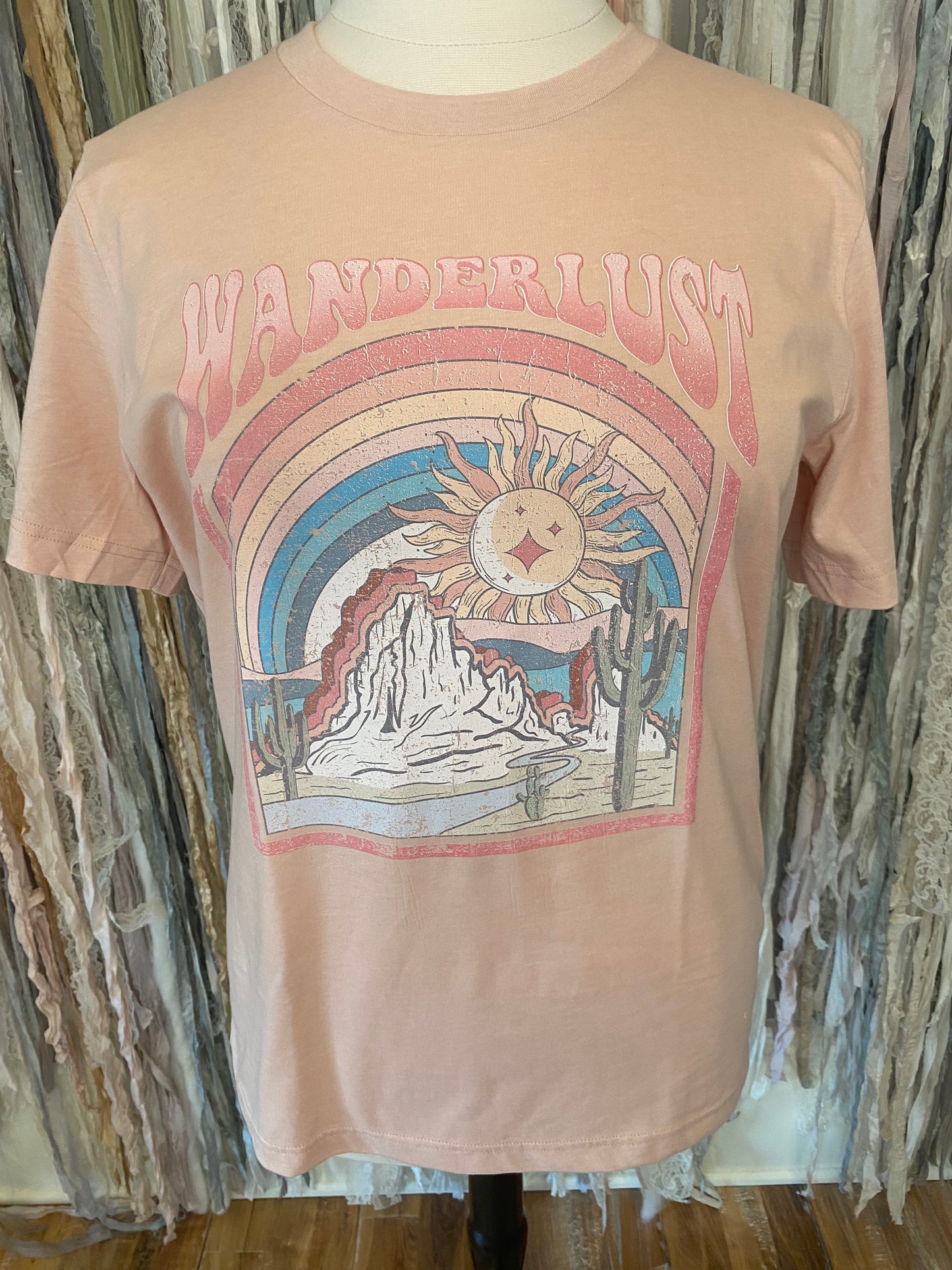 Made To Order Line - T-Shirt with Wanderlust Written on it